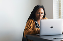 unsplash_HA-0i0E7sq4_woman on laptop.webp